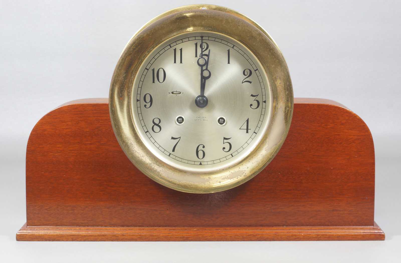 Appraisal: Chelsea Ships Bell Brass Clock dial on mahogany base -