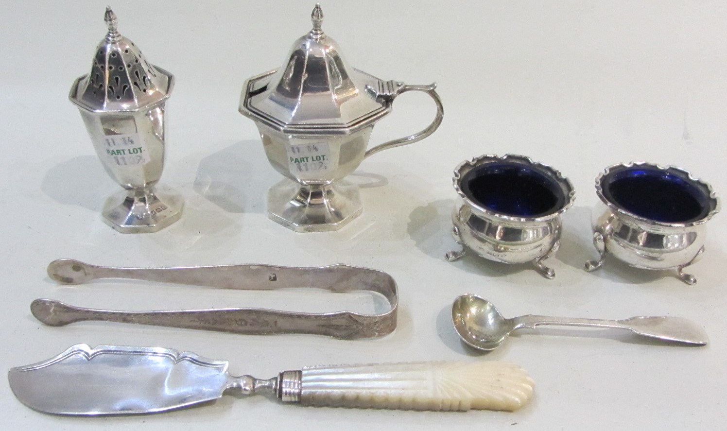 Appraisal: Silver comprising a pair of circular salts each raised on