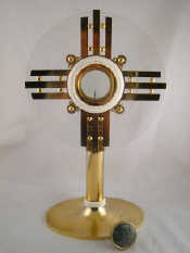 Appraisal: A French monstrance in silver gilt lucite and ivory c