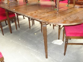 Appraisal: A th Century dining table together with a set of