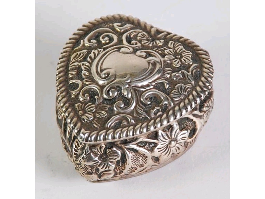 Appraisal: VICTORIAN SILVER HEART SHAPED SMALL TRINKET BOX repousse with flowers