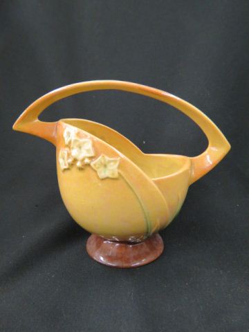 Appraisal: Roseville Pottery Wincraft Basket yellow-brown glossy - excellent