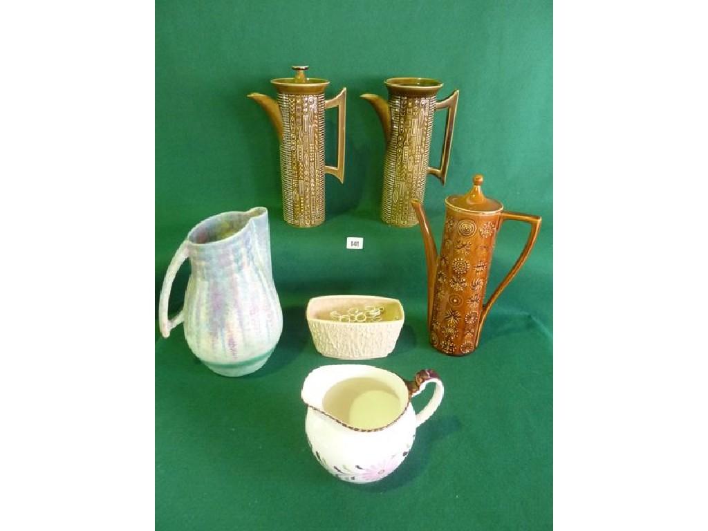 Appraisal: A Portmeirion Pottery Totem design coffee pot in a mustard