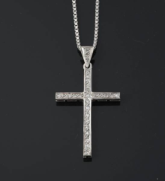 Appraisal: A diamond and white gold cross pendant with chain