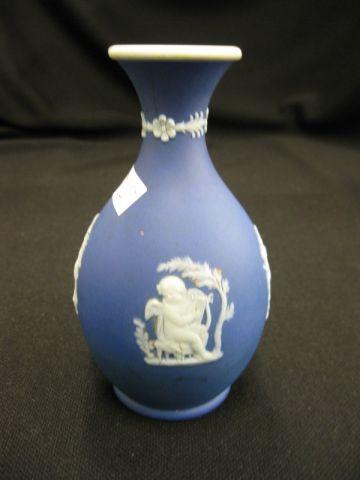 Appraisal: Wedgwood Dark Blue Jasperware Bud Vase seated hunter opposite seated