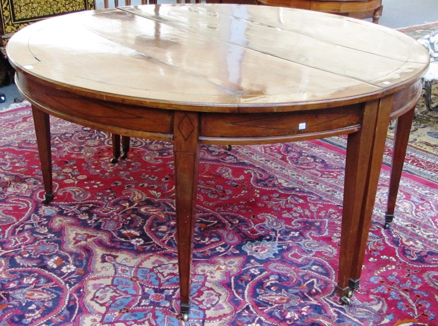 Appraisal: A pair of late th century Northern European inlaid mahogany