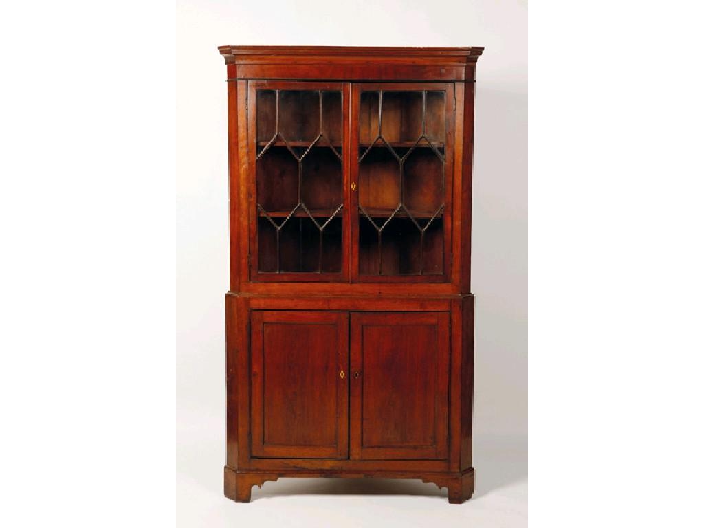 Appraisal: A GEORGE III OAK FREESTANDING CORNER CUPBOARD the upper section