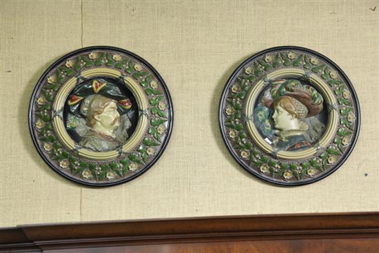 Appraisal: PAIR OF PORTRAIT PLAQUES One with man and one with