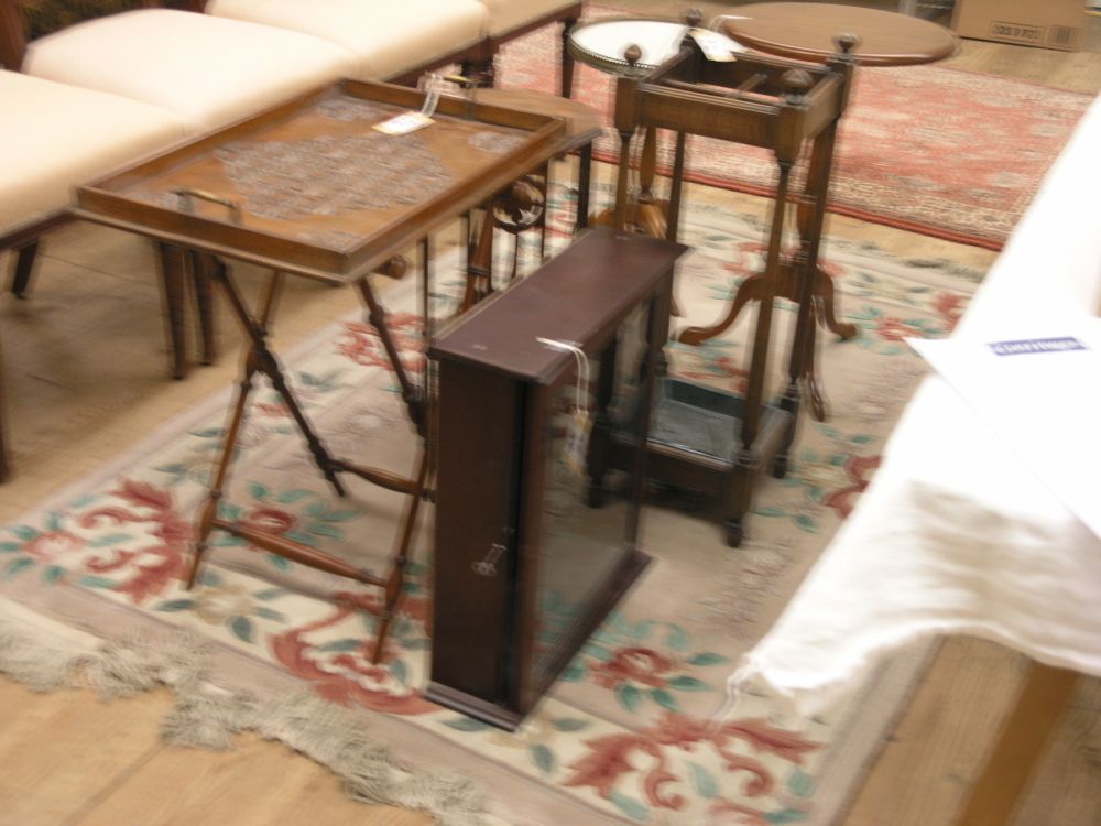 Appraisal: An oak tray carved with lozenge devices on folding stand