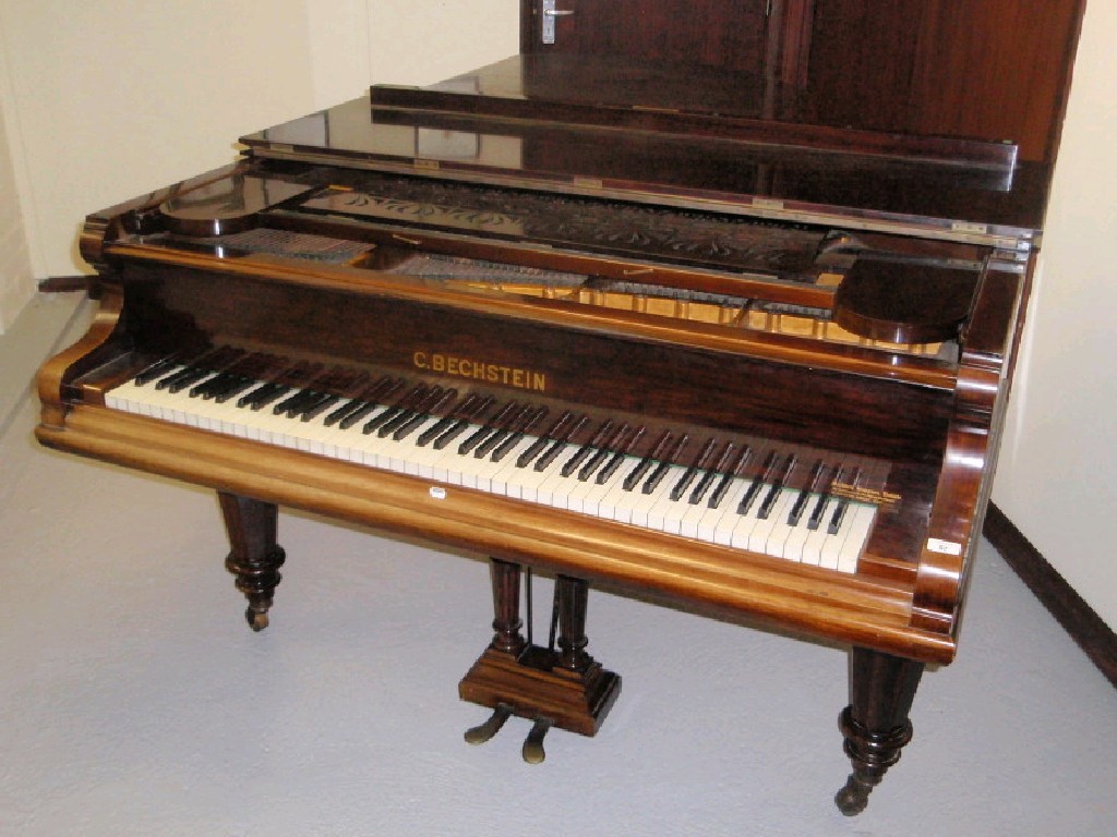 Appraisal: A C Bechstein of Berlin rosewood cased baby grand piano