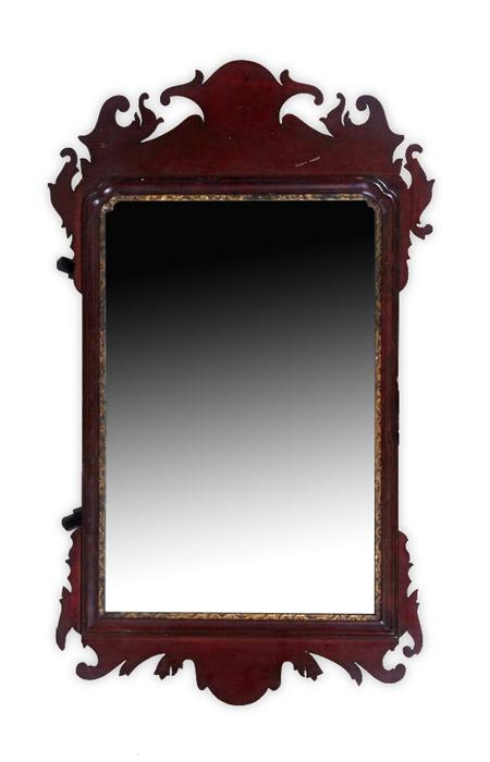 Appraisal: A th century mahogany wall mirror the foliate carved frame