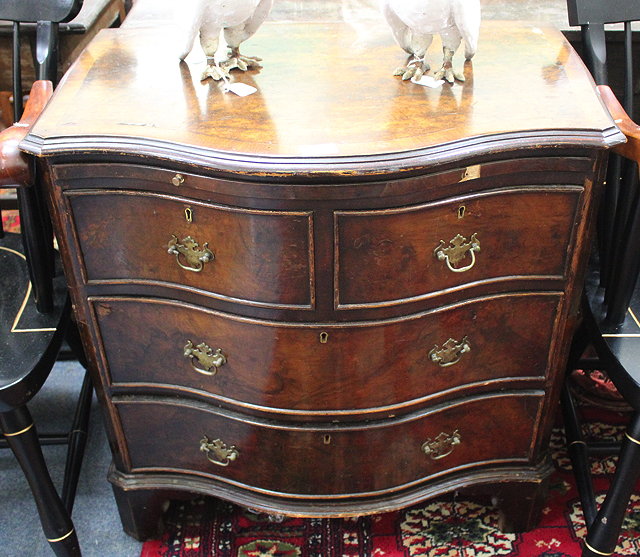 Appraisal: AN TH CENTURY STYLE WALNUT VANEERED SMALL SERPENTINE CHEST of