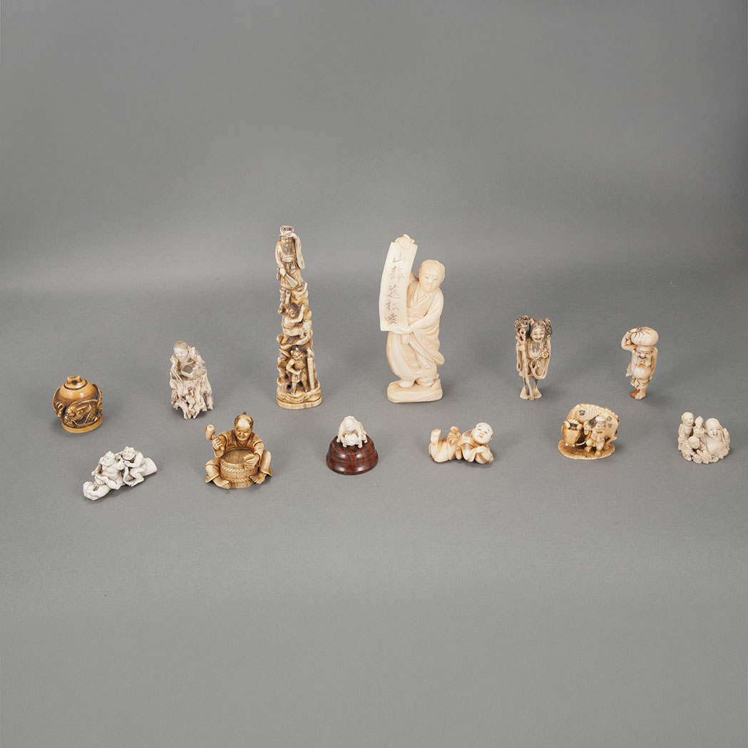 Appraisal: Group of Twelve Japanese Ivory Netsuke Including figural groups and