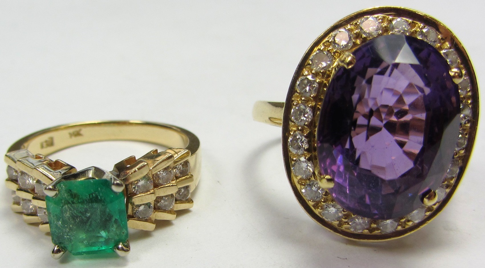 Appraisal: A gold amethyst and diamond set oval cluster ring claw