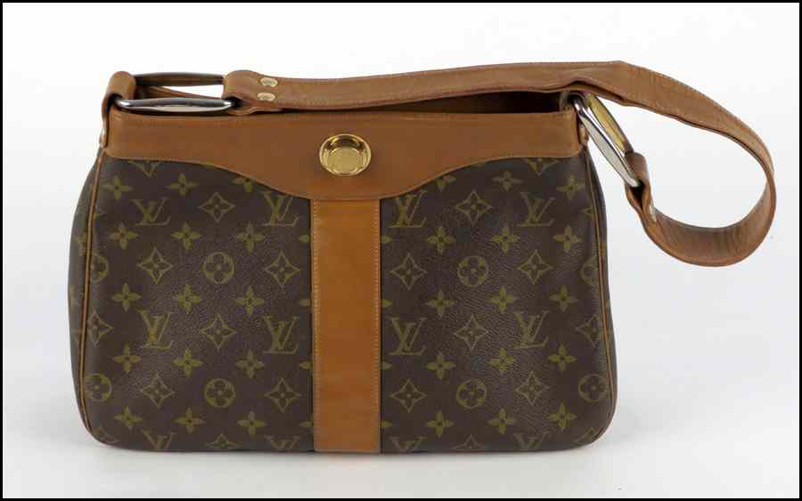 Appraisal: LOUIS VUITTON MONOGRAMMED CANVAS AND LEATHER HOBO STYLE HANDBAG H