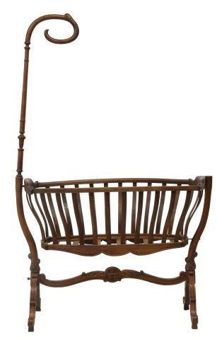 Appraisal: Victorian walnut child's cradle late th c scrolled canopy hook