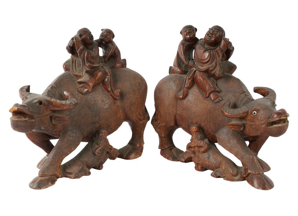 Appraisal: TWO CHINESE CARVED WOOD ANIMAL GROUPSCondition each with some wood