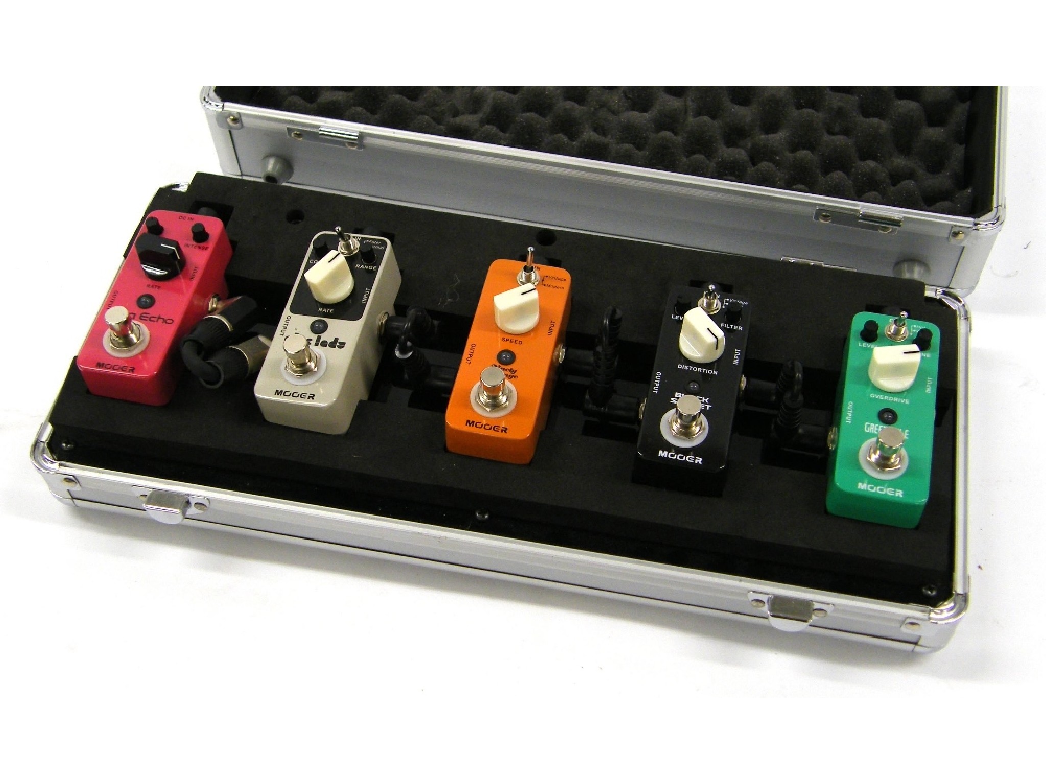 Appraisal: Five Mooer effects pedals within a fitted Mooer flight case