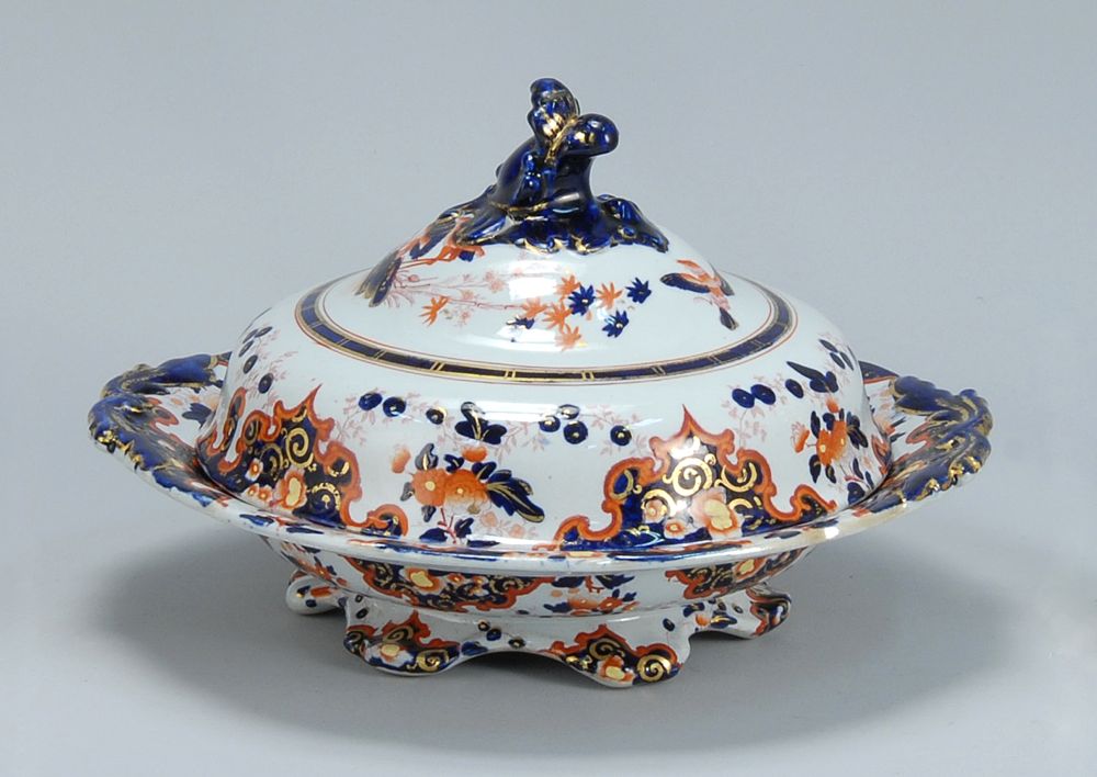 Appraisal: POLYCHROME IRONSTONE COVERED ENTREE DISH Circa With cobalt blue and