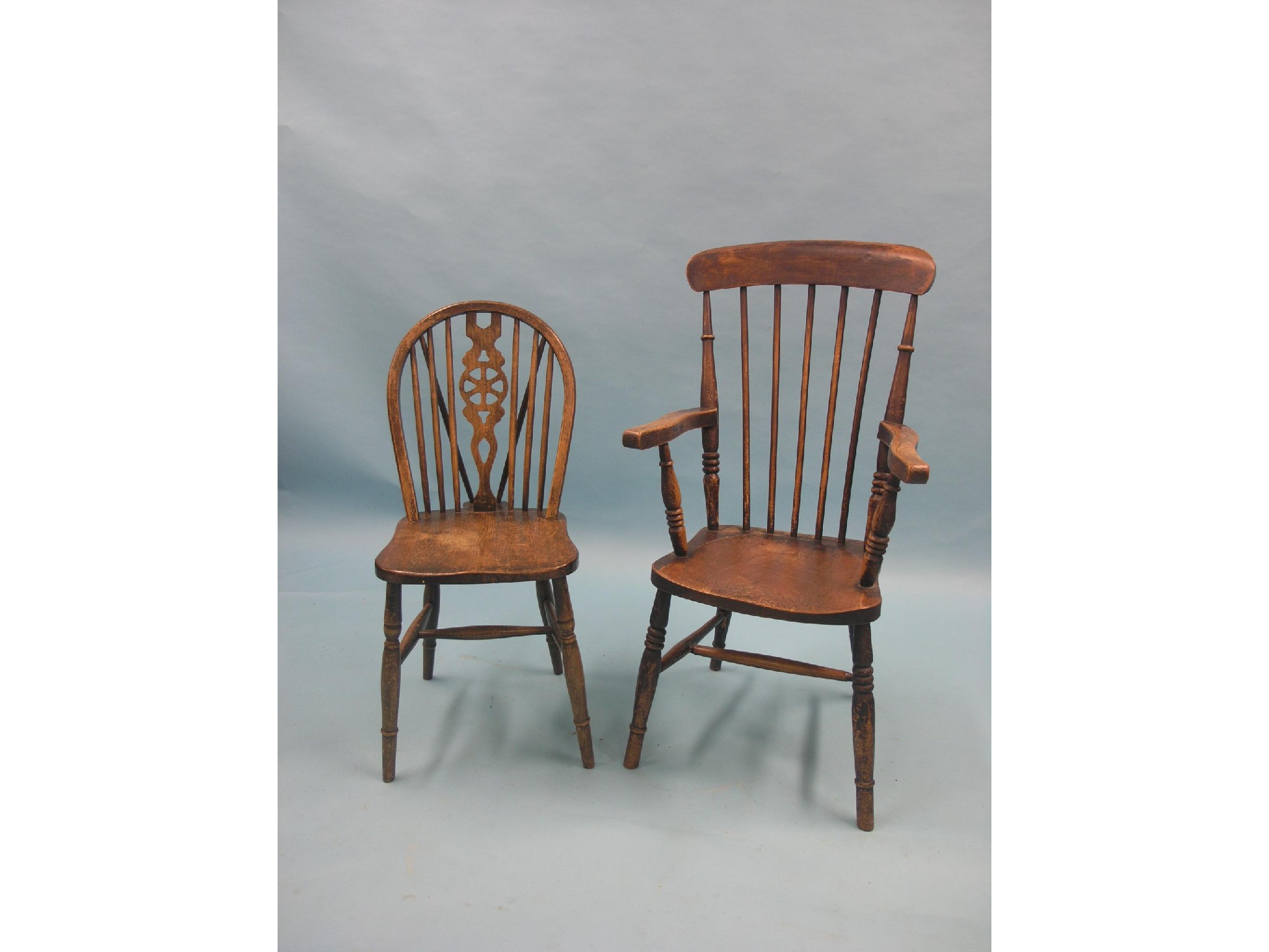 Appraisal: A Victorian Windsor stick-back elbow chair together with a set