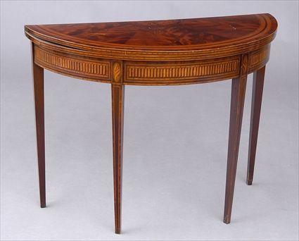 Appraisal: GEORGE III INLAID MAHOGANY DEMILUNE CARD TABLE The cross-banded folding