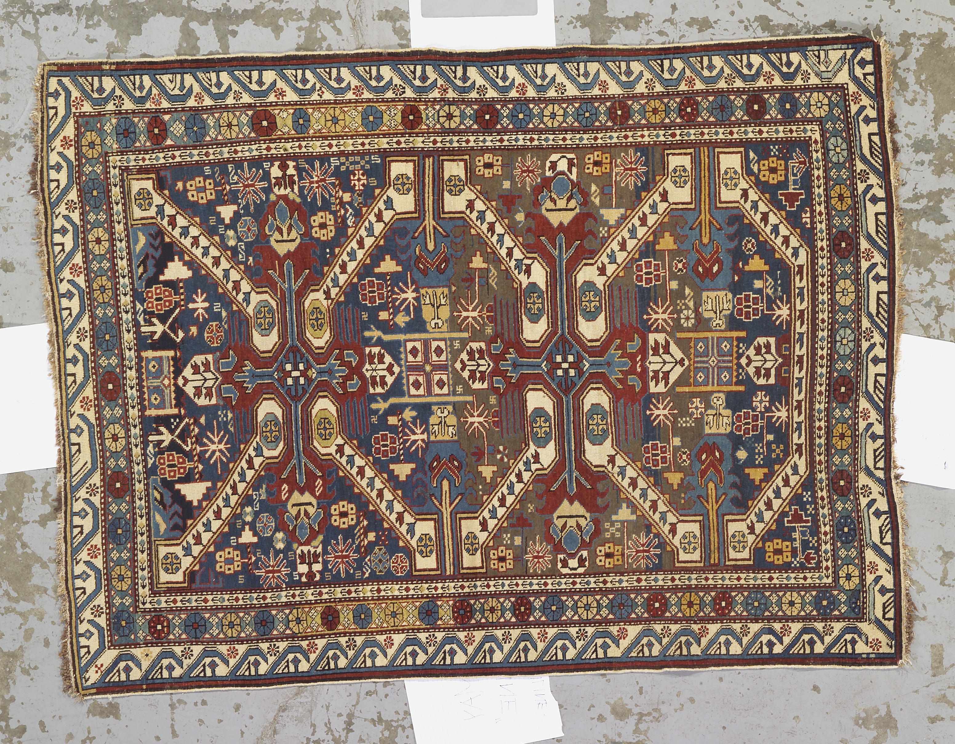 Appraisal: A Kuba rug Caucasuslate th centurysize approximately ft x ft