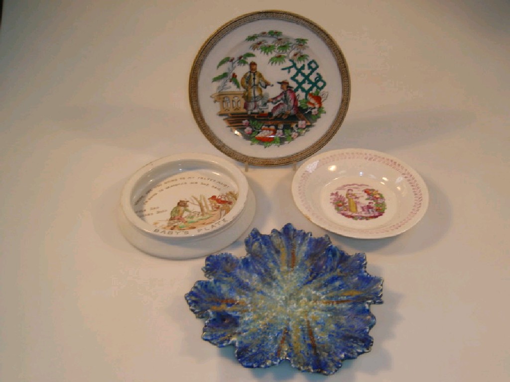 Appraisal: A Bretby leaf dish in mottle blue and ochre glaze