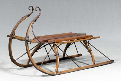 Appraisal: Pony sleigh bentwood fronts with conforming scrolled iron mounts early