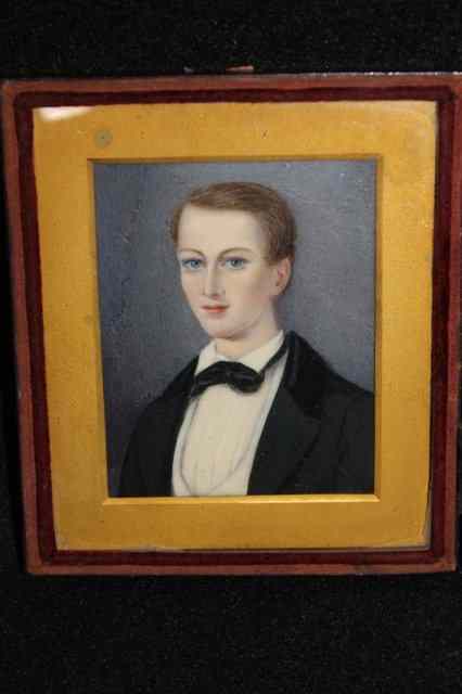 Appraisal: ENGLISH SCHOOLMiniature portrait of a young gentleman in a Morocco