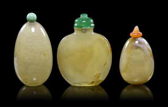 Appraisal: A Group of Three Chinese Carved Agate Snuff Bottles of