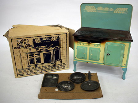 Appraisal: AN OLD TIN 'KIDDIES REAL COOKING RANGE' with pans and