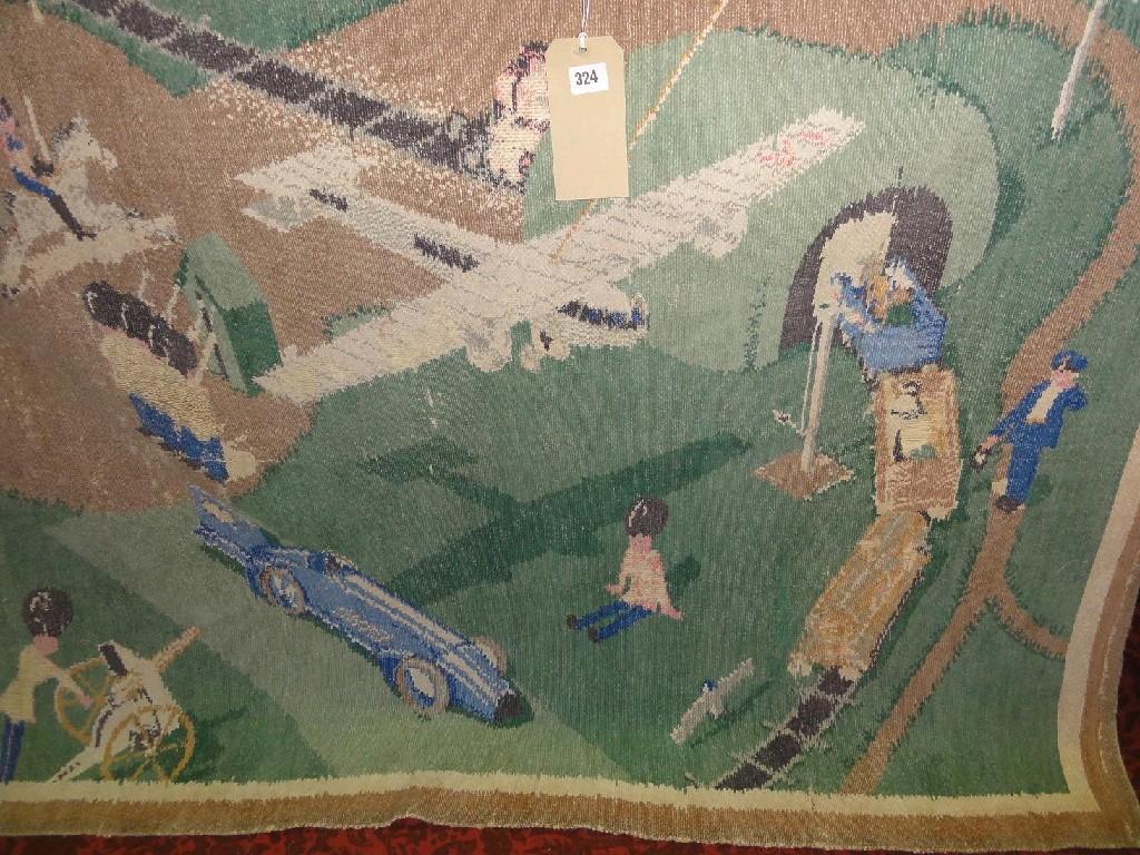 Appraisal: A nursery wall hanging made of wool featuring Donald Campbell's