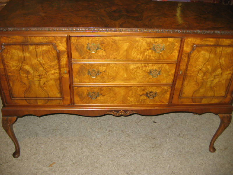 Appraisal: ENGLISH BURL-WALNUT SIDEBOARD Three central drawers flanked by a pair