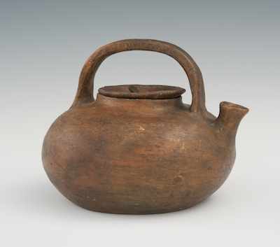 Appraisal: A Pre-Columbian Lidded Pot Burnished pottery with overall brown color