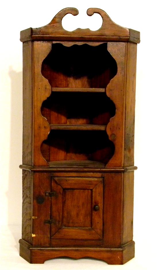 Appraisal: Miniature pine corner cupboard three open shelves over one paneled