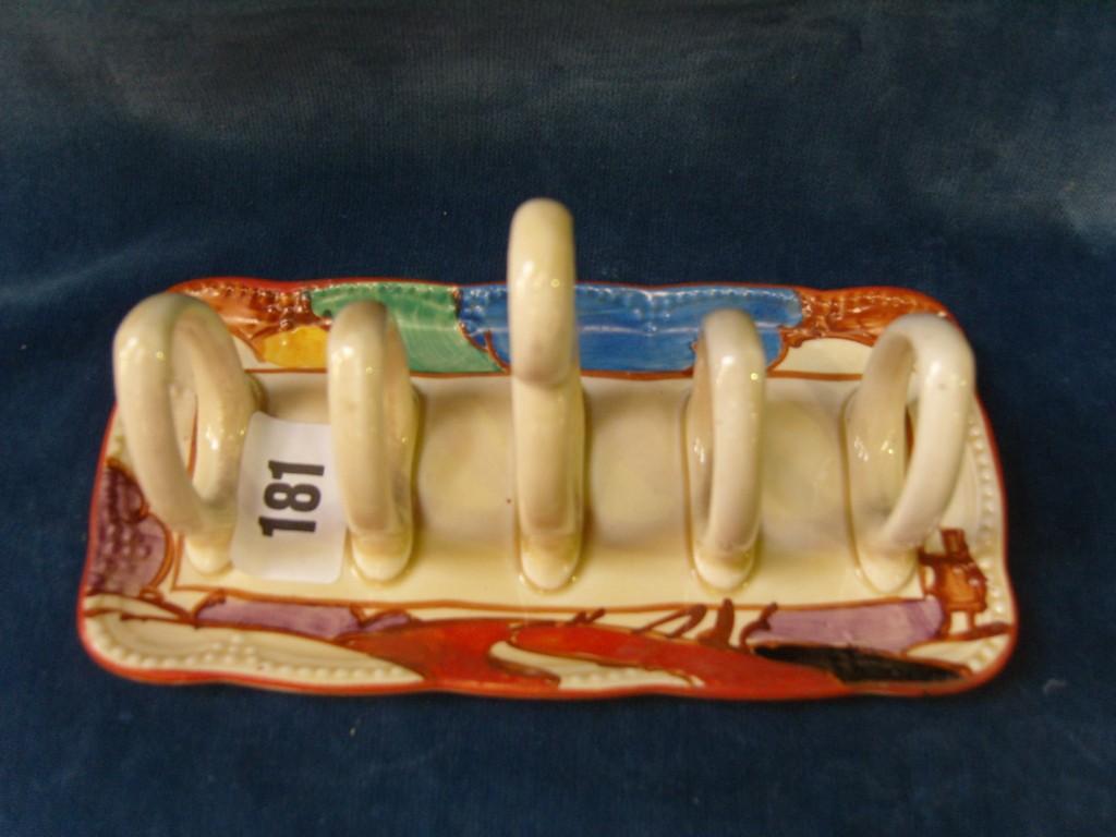 Appraisal: A Clarice Cliff Bizarre Fantasque -section toast rack of rectangular