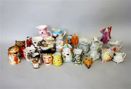 Appraisal: Collection of novelty ceramic creamers Including clowns playing cards fairy