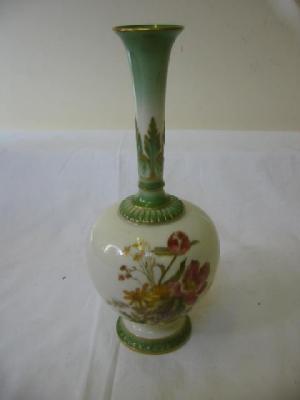 Appraisal: A ROYAL WORCESTER PORCELAIN VASE of bottle form with green