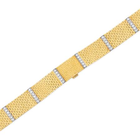 Appraisal: Gold and Diamond Bracelet-Watch Cartier Estimate -