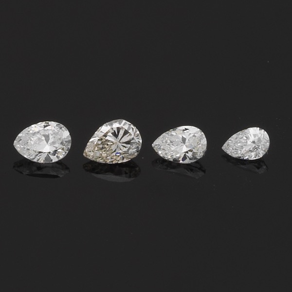 Appraisal: FOUR UNMOUNTED CT TOTAL PEAR CUT DIAMONDS Unmounted ct total