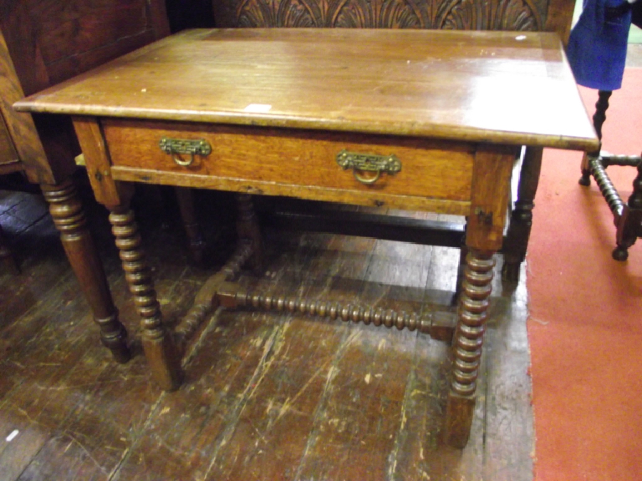 Appraisal: A th century oak side table the planked top with