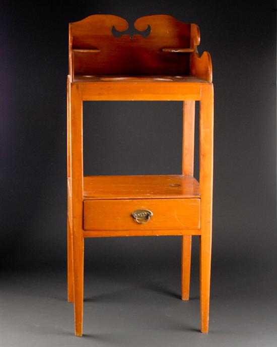 Appraisal: A th C Pine Washstand having an extravagantly shaped three