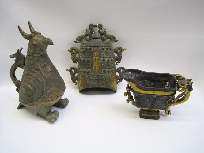 Appraisal: THREE CHINESE PATINATED METAL VESSELS with gold accents various stylized