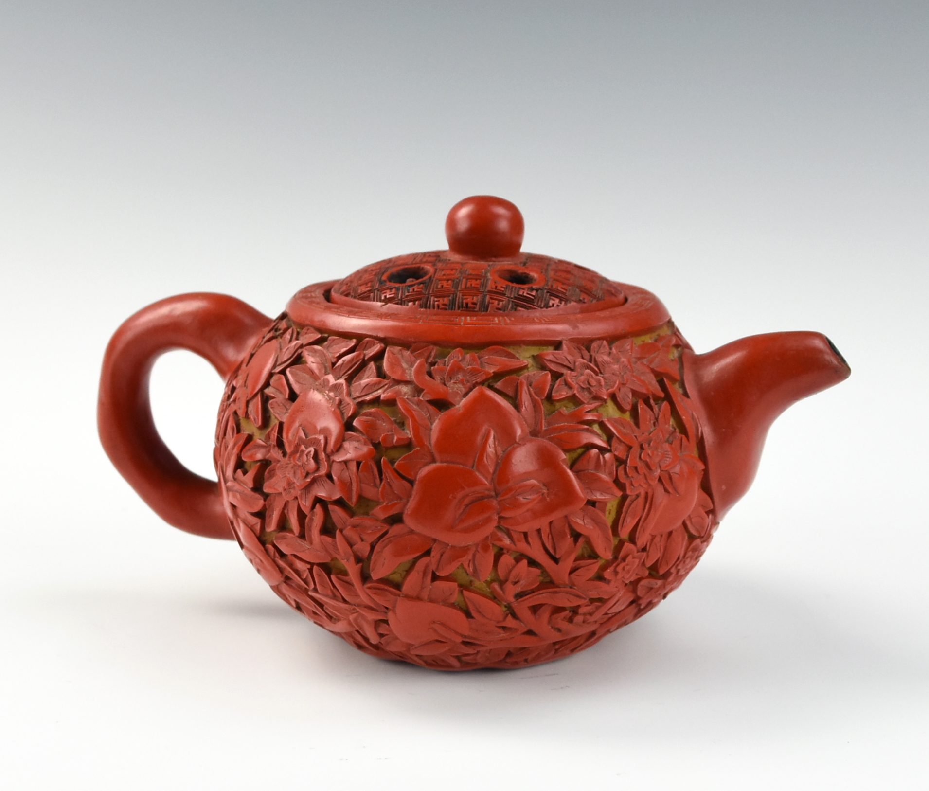 Appraisal: CHINESE CINNABAR LACQUER WARE ZISHA TEAPOT of compressed globular form