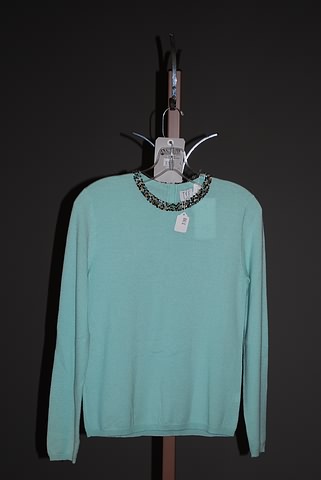 Appraisal: TSE pale green cashmere knit top with decorative neck and