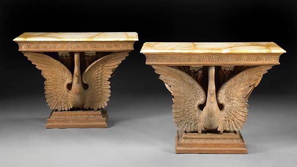 Appraisal: A pair of Continental Neoclassical style carved pine console tables