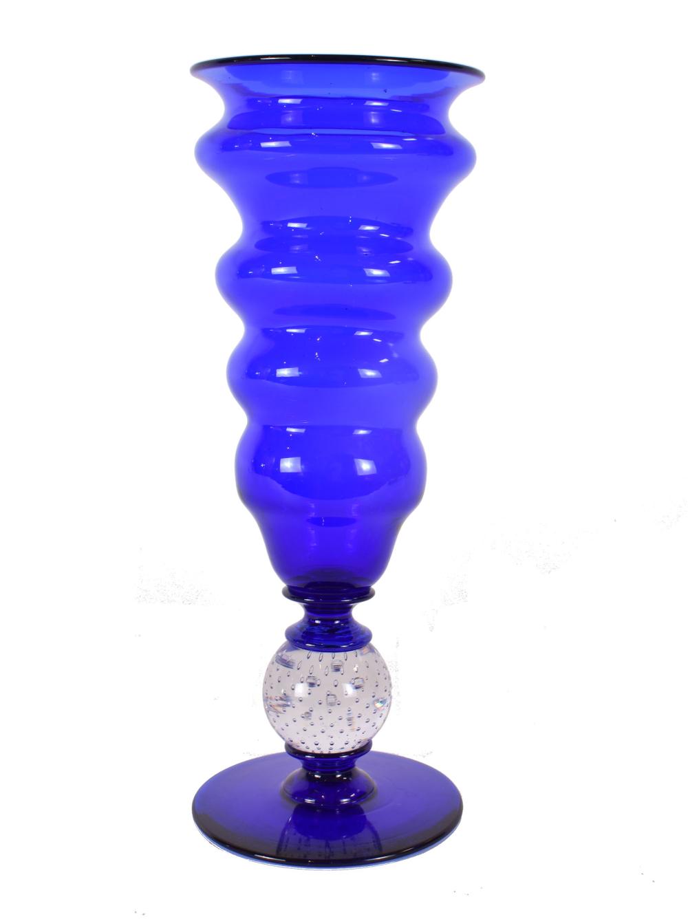 Appraisal: PAIRPOINT COBALT BLUE GLASS FOOTED VASEThe body blown to represent