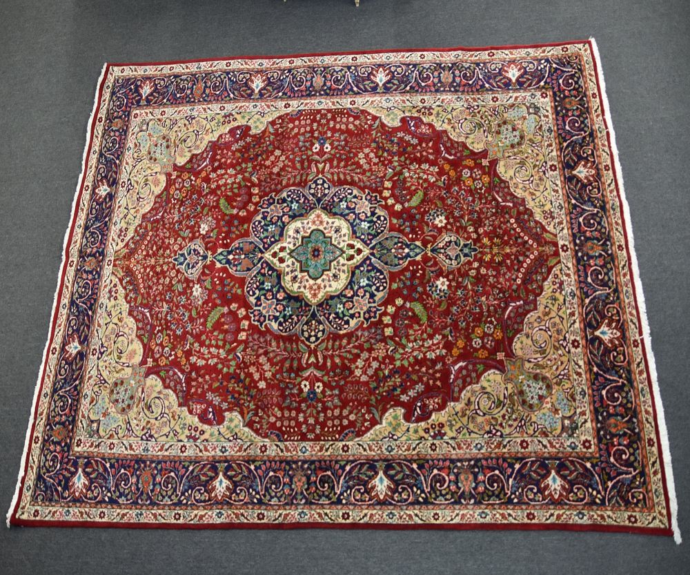 Appraisal: Tabriz Carpet Colorful room size Tabriz carpet wool with center