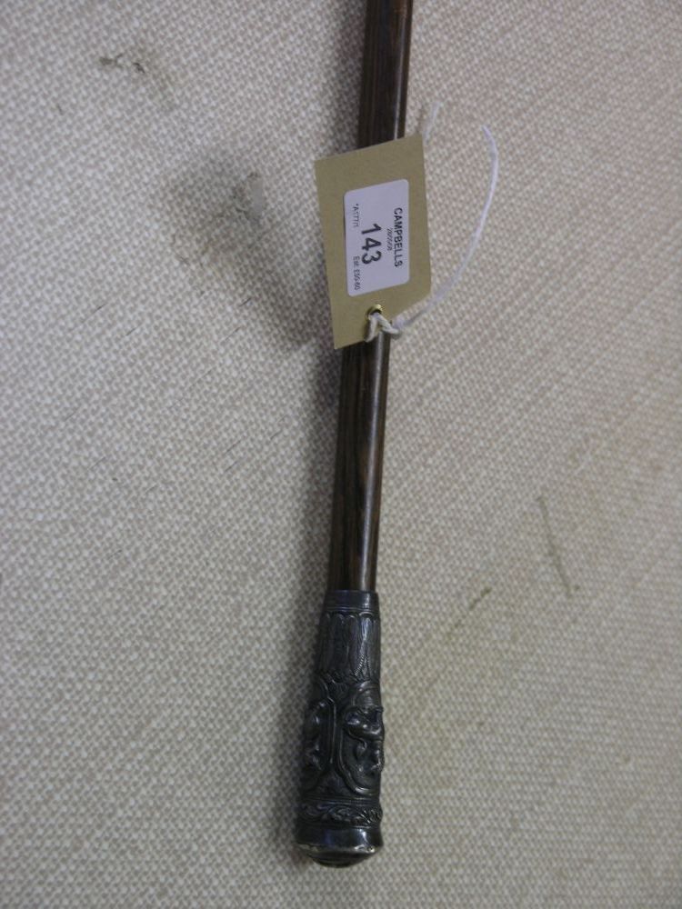 Appraisal: A Chinese rosewood walking cane with white metal handle and