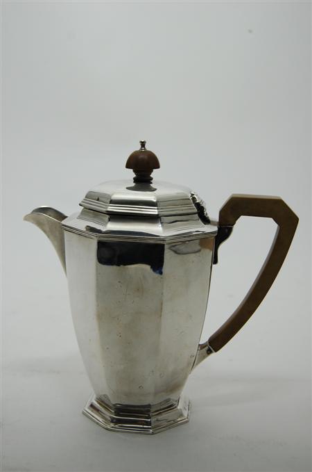 Appraisal: An octagonal silver teapot Aidie Brothers Birmingham of panelled octagonal